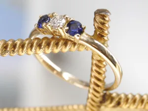 Gouden ring met rij saffier en diamant