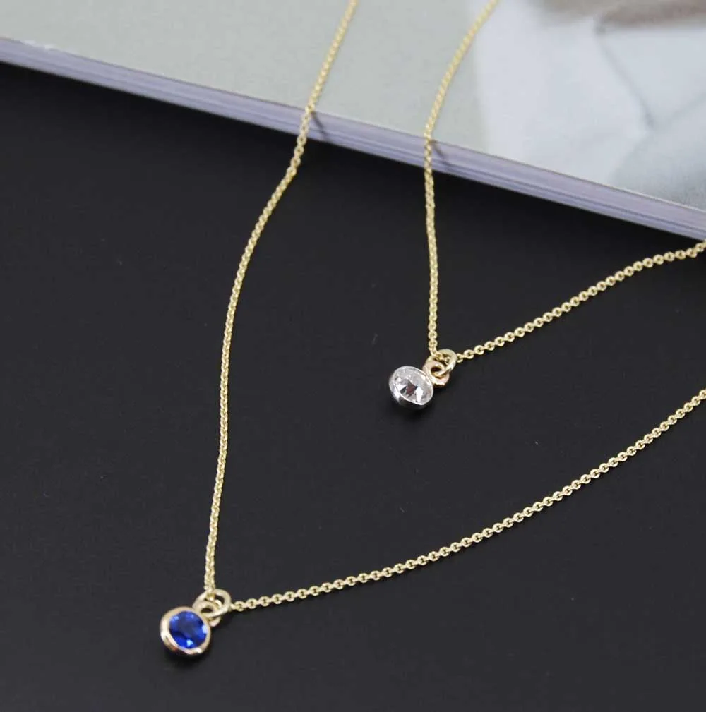 Geelgouden ketting met Saffier bedel en diamant 0,10ct