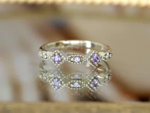 Gouden ring met Diamant en roze Saffier