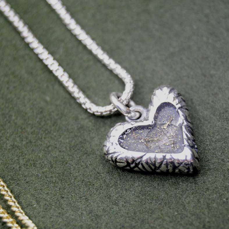 Zilveren ashanger met hart